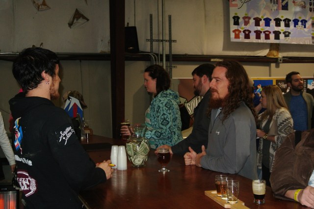 Lance at the bar ordering hos next Libation. 